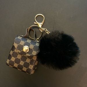 My geometric graphic Pom Pom charm coin bag